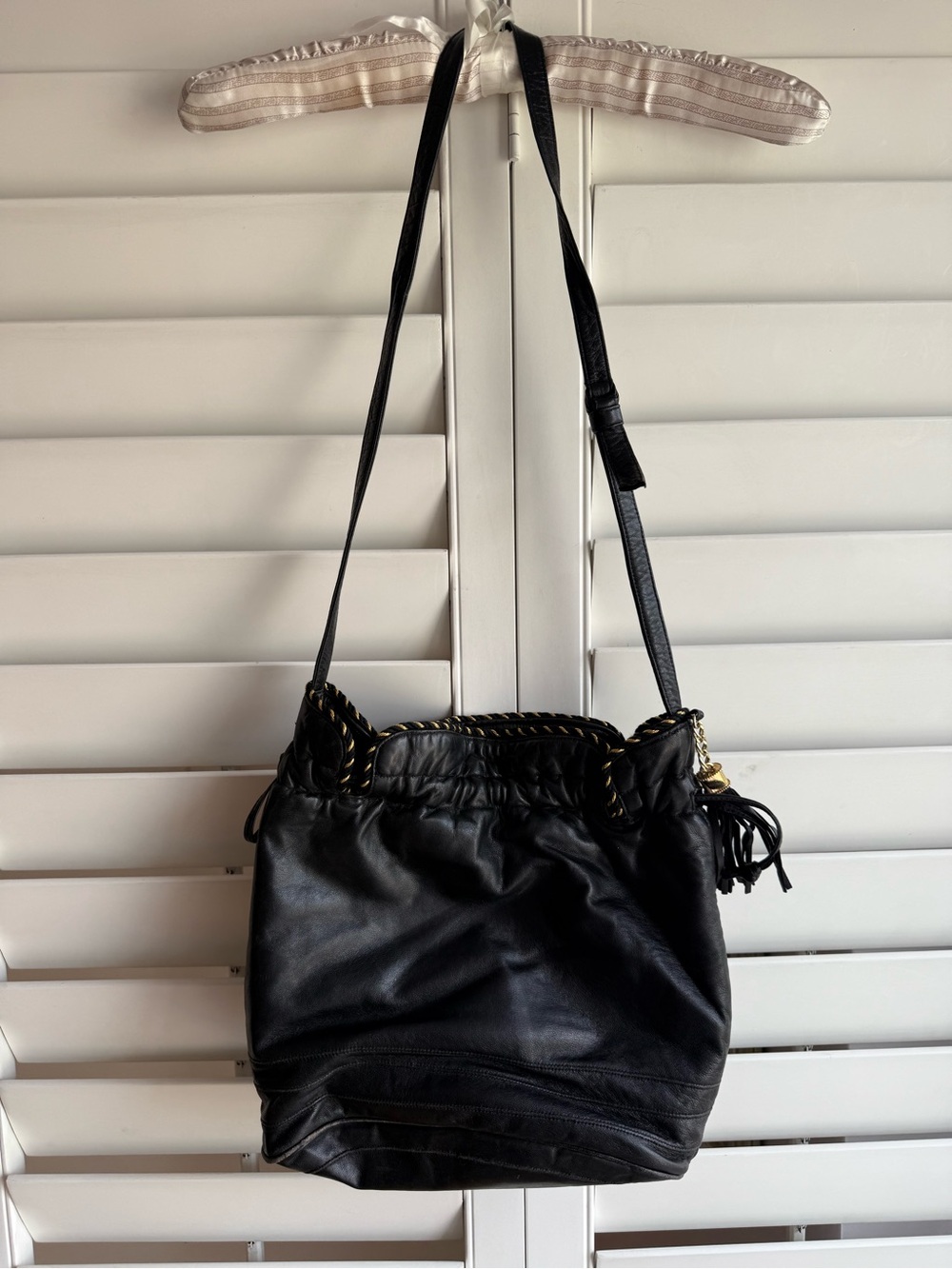 Black Leather Shoulder Bag with Braided Gold-Trim chain and Tassel